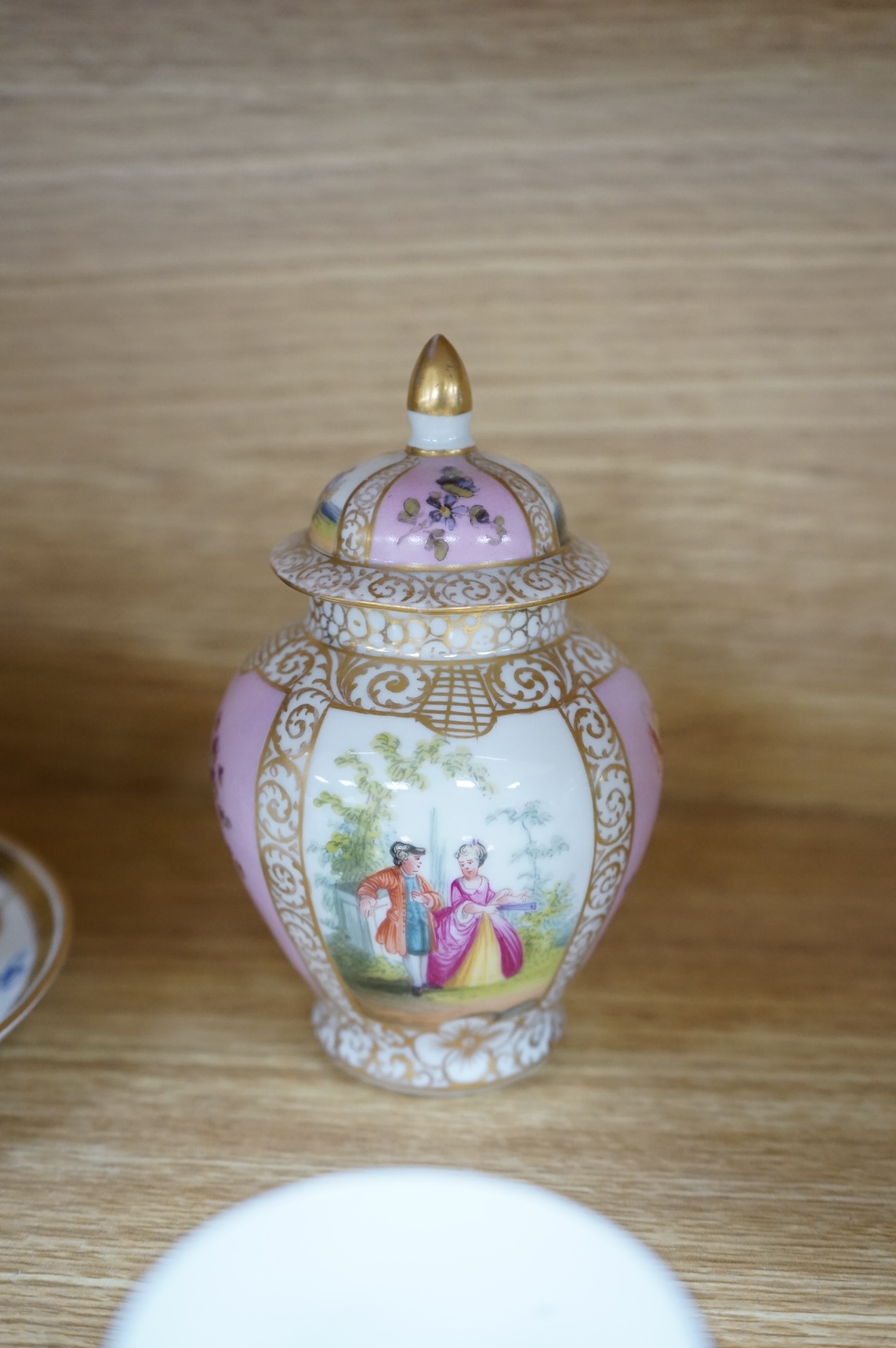 A Worcester butterfly handled cup and saucer and four other items, together with Royal Crown Derby, Dresden and Coalport items. (9). Tallest 13 cm